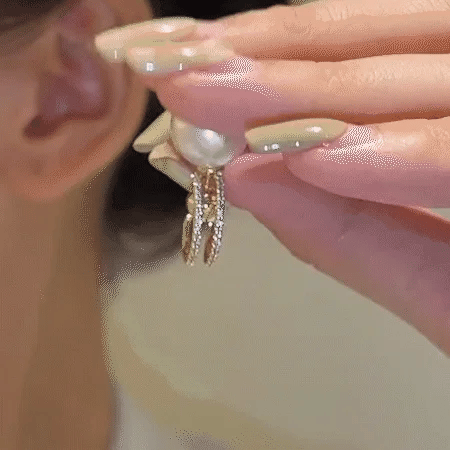 Pearl earrings (various wearing styles)
